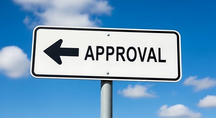 Approval sign pointing left against a cloudy blue sky