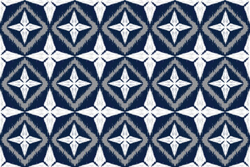 Modern Ikat pattern design featuring soft geometric shapes inspired by traditional tie-dye weaving. Elegant blue, white, and beige tones create a natural and artistic texture. Perfect for textile prin