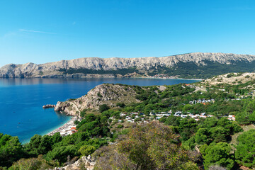 Fototapeta premium Scenic coastal landscape with rocky hills and clear blue sea. Baska, Krk island, Croatia