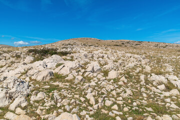 Rocky landscape and clear blue sky on sunny day