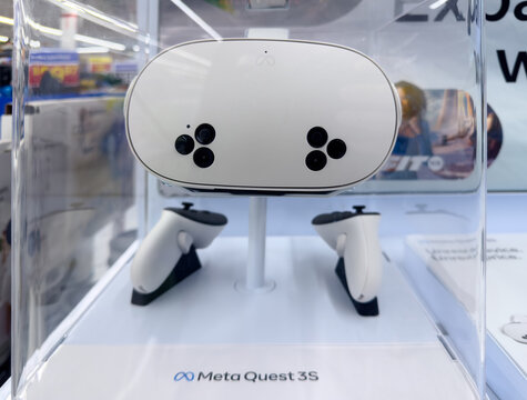 Calgary, Alberta, Canada. Oct 30, 2025. Meta Quest 3S virtual reality headset with controllers on display in retail store showcase with brand logo visible