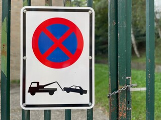 Sign that says No parking zone or your car will be towed