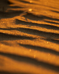 Beautiful sand patterns at the beach of Baltic Sea. Sunny summer evening in Latva.