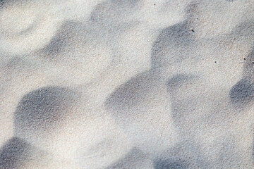 Beautiful sand patterns at the beach of Baltic Sea. Sunny summer evening in Latva.