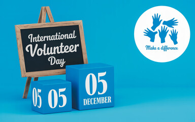 International volunteer day celebrated with blue cubes and blackboard