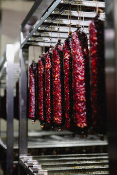 Smoked sausage production line in the factory