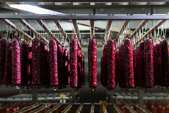 Smoked sausage production line in the factory