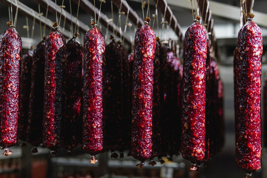 Smoked sausage production line in the factory