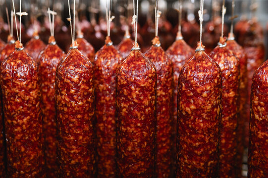 Smoked sausage production line in the factory