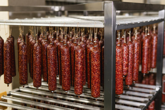 Smoked sausage production line in the factory