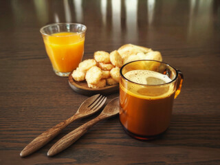 Breakfast set: hot coffee, pastries and orange juice