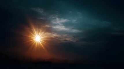 Fototapeta premium A bright golden sunburst shines through dark dramatic clouds at dusk casting an ethereal glow over a misty landscape