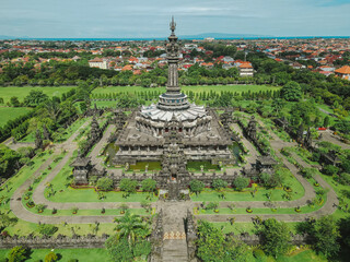 Aerial view of Bajra Sandhi Monument in Denpasar CIty with blue sky, Bali, Indonesia