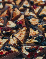 Decorated catering table, banquet with variety of different gourmet exquisite food snacks appetizers on corporate birthday party event or wedding celebration, canape, salad, delicatessen setting