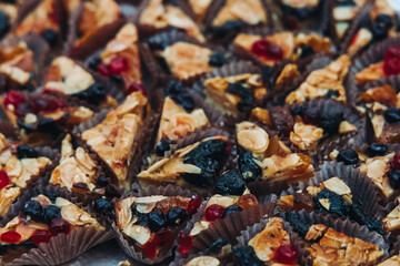 Decorated catering table, banquet with variety of different gourmet exquisite food snacks appetizers on corporate birthday party event or wedding celebration, canape, salad, delicatessen setting