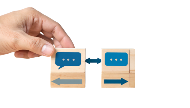 Hand connecting wooden blocks with speech bubble, arrows, conveying communication