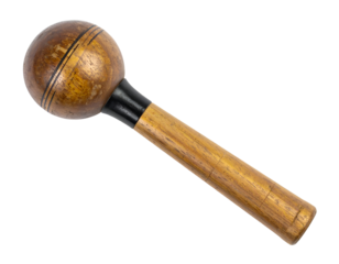 wooden maraca percussion shaker with spherical head and black collar on isolated background