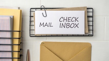 Organized Workspace with Mail Reminder and Stationery Items