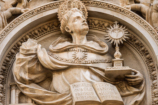 Saint Thomas Aquinas relief at Magdalena church in Seville Spain