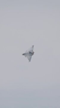 Fighter jet preforming high speed maneuvers showing its abilities