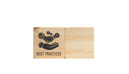 Two wooden blocks, one with gears and handshake, "Best Practices" text