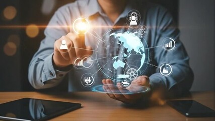 Businessman interacting with a futuristic holographic globe displaying data and analytics icons - Powered by Adobe