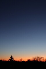 Fototapeta premium Orange and purple clouds at dawn