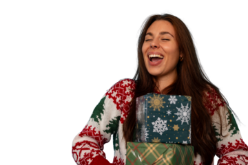 Young woman confidently holding christmas gifts, laughing with closed eyes, wearing a festive holiday sweater on a transparent background