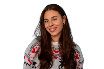 Young woman smiling, wearing a festive christmas sweater, celebrating the holiday season, transparent background