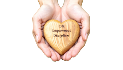 Cupped hands cradle a wooden heart with "Oh. Empowered Discipline" inscribed