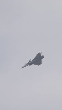 Fighter jet preforming high speed maneuvers showing its abilities