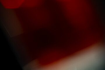 Abstract red light background design with glowing motion bubbles and dark texture pattern