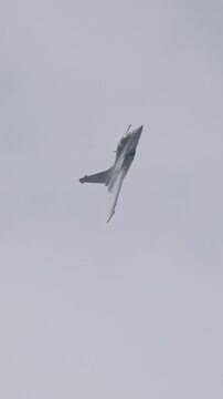 Fighter jet preforming high speed maneuvers showing its abilities