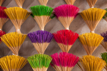 Colorful incense sticks for sale at a roadside stand in Hue, Vietnam
