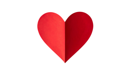 A vibrant red heart shape created from folded paper, set against a stark black background