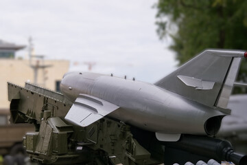 Military drone on launch pad during demonstration event in urban area