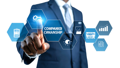 Businessman touching glowing digital hexagon interface with "COMPANIONSHIP" central