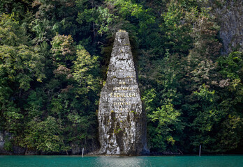View from a boat of the Schillerstein monument in Lake Lucerne in the canton of Uri, Switzerland