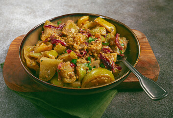 fried green tomatoes, with onions and spices, green tomato appetizer, Georgian cuisine, homemade, no people,