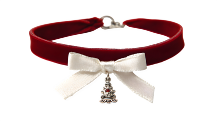 Red velvet choker with miniature sleigh pendant and white satin bow, delicate holiday jewelry, isolated on white background