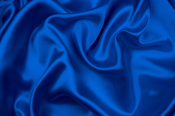 Obraz premium Smooth elegant blue silk or satin texture can use as abstract background.