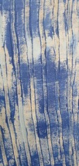 Blue and White Textured Plaster Wall. Blue background.