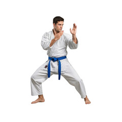 Martial artist in traditional white gi and blue belt performs a defensive stance isolated on transparent background