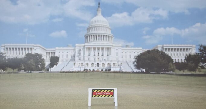 Political & economic disruption : Close-up of a yellow &ldquo;SHUTDOWN&rdquo; board at the U.S. Capitol building, symbolising the government funding stand-off, federal service freeze and economic risk.