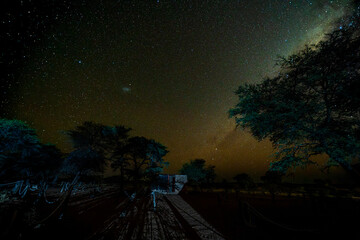 Naklejka premium time lapse of stars and clouds