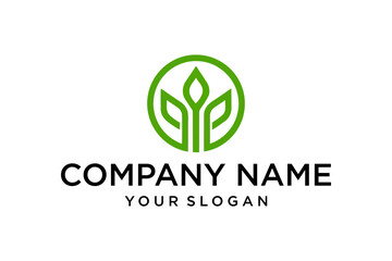 Modern green leaf logo in a circle. Abstract plant symbol with company name and slogan, representing growth and nature.