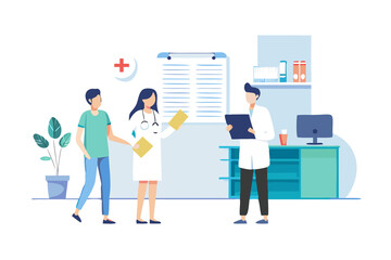 Obraz premium Medical professionals providing a healthcare consultation to a young man in the clinic