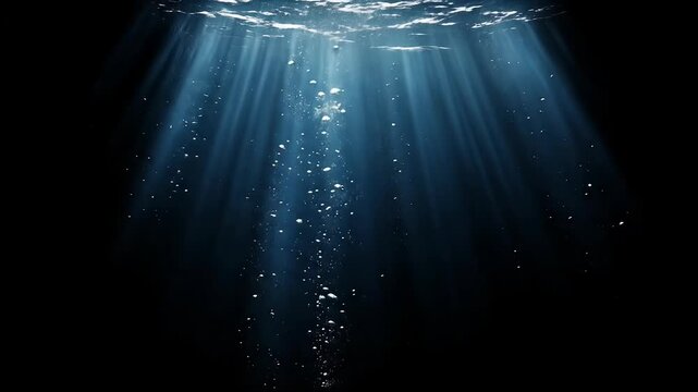 Rayos de sol atravesando una gruesa capa de superficie del mar u oc&eacute;ano, fondo submarino en bucle, metraje de video
