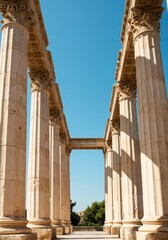 Fototapeta premium Majestic stone columns supporting an ancient structure against a clear blue sky, symbolizing enduring architecture of the empire and classical design, background, history, temple