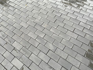 Abstract background. New cobblestone pavement closeup